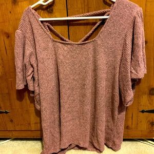 This crop top has flowy sleeves